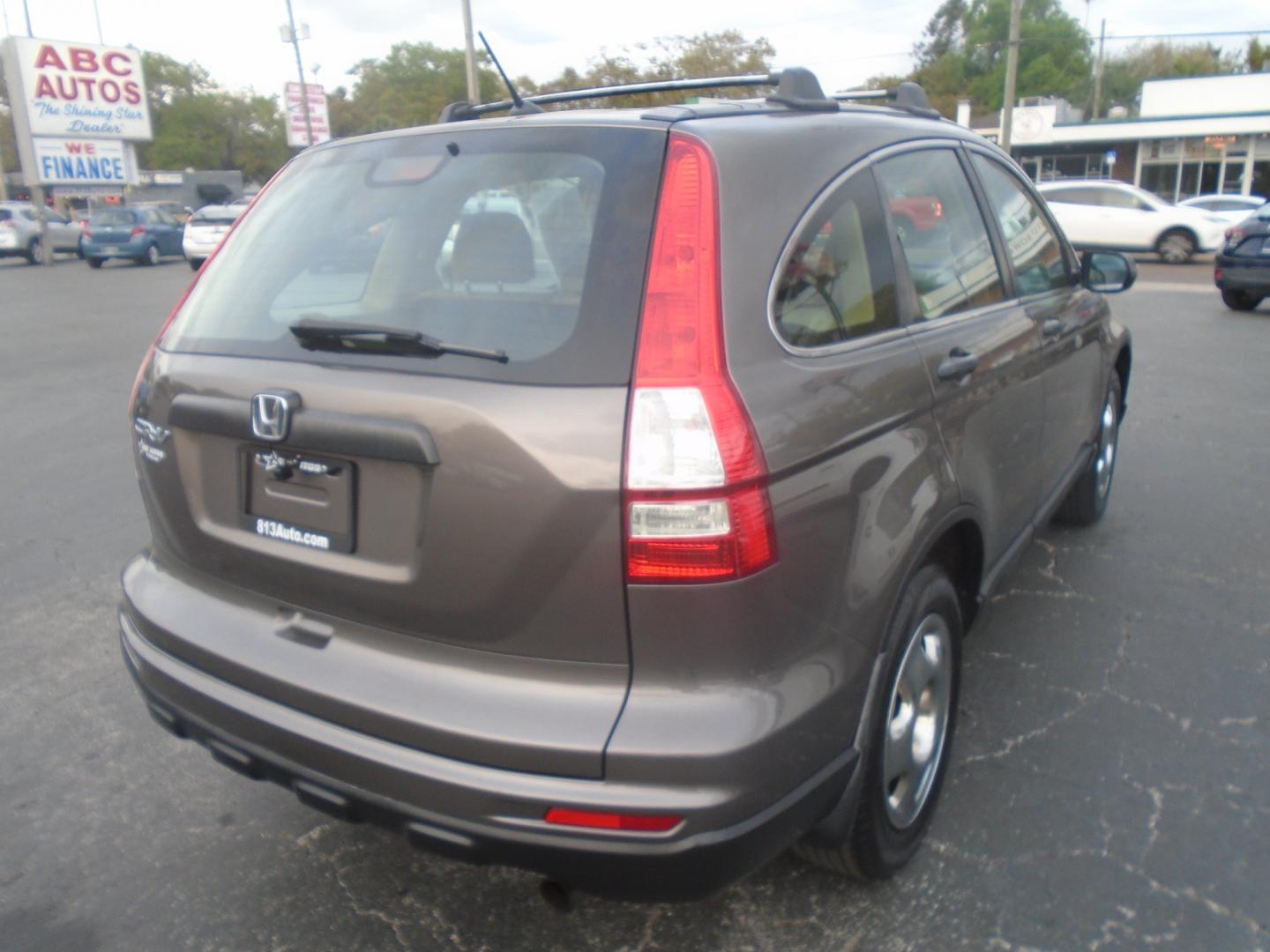 2011 GRAY HONDA CR-V (3CZRE3H34BG) with an L4 2.4L engine, CVT transmission, located at 6112 N Florida Avenue, Tampa, FL, 33604, (888) 521-5131, 27.954929, -82.459534 - Photo#3